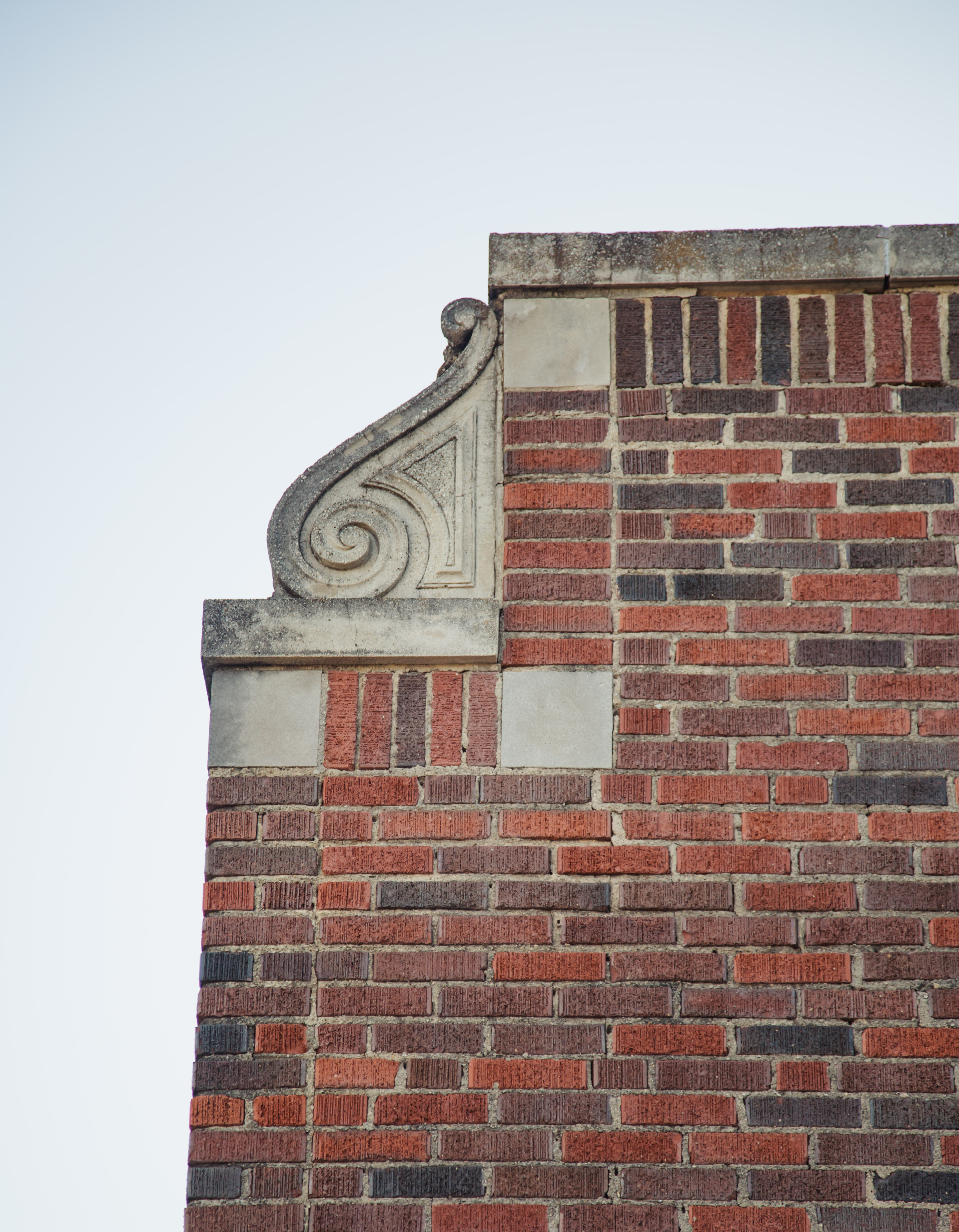 Brickwork and carved stone detailing at Tyler Station in Oak Cliff