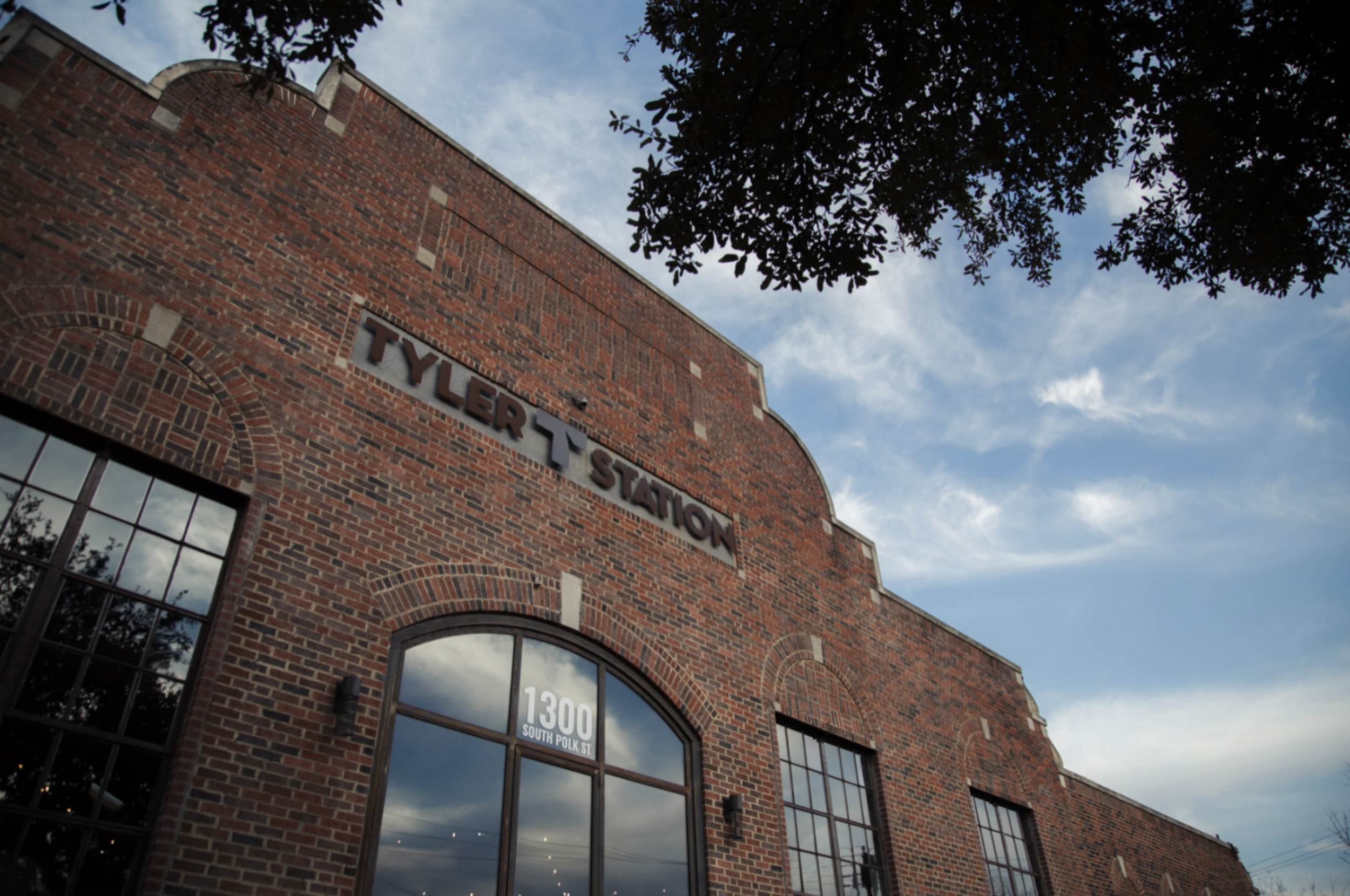 Brick facade, steel windows, and Tyler Station signage in Oak Cliff